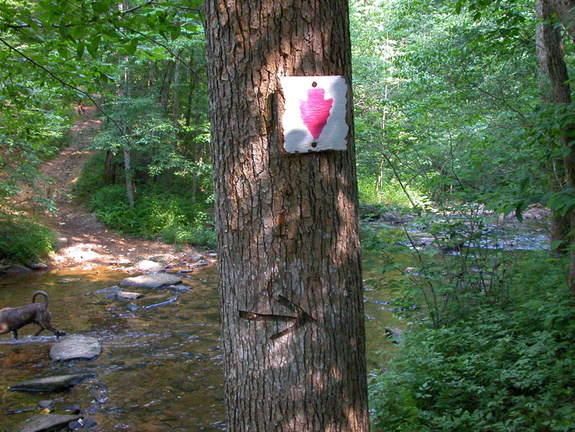 Historic, obsolete trail sign (replaced with plastic signs).