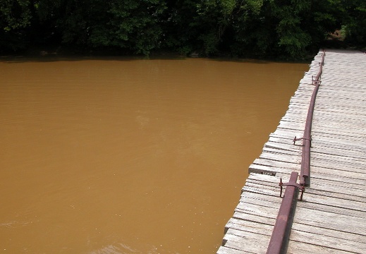 Old Leatherwood bridge across swollen Big South Fork. 