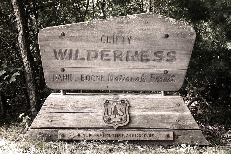 Carved wood sign: Clifty Wilderness Area